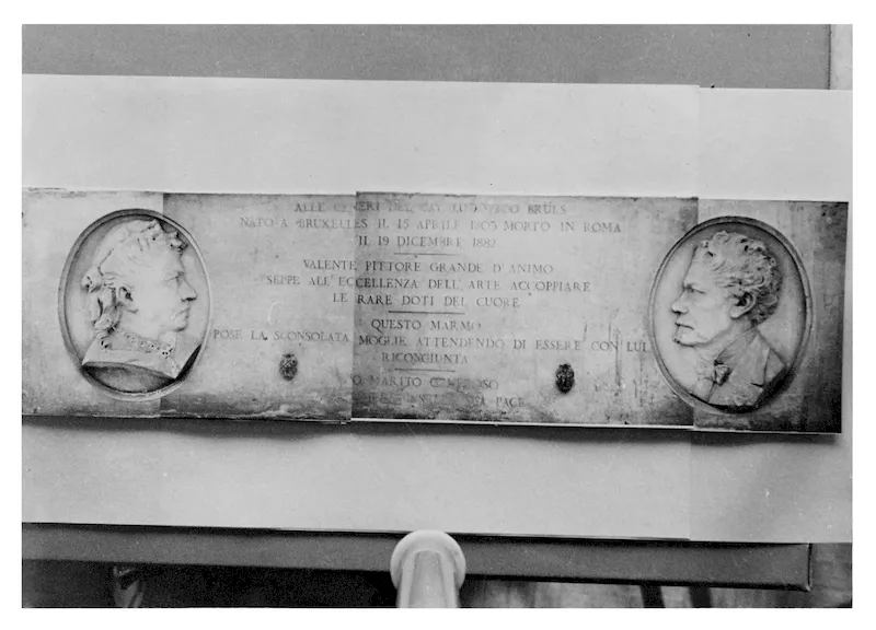 Die Marmortafel trägt zwei skulptierte Profilmedaillons.